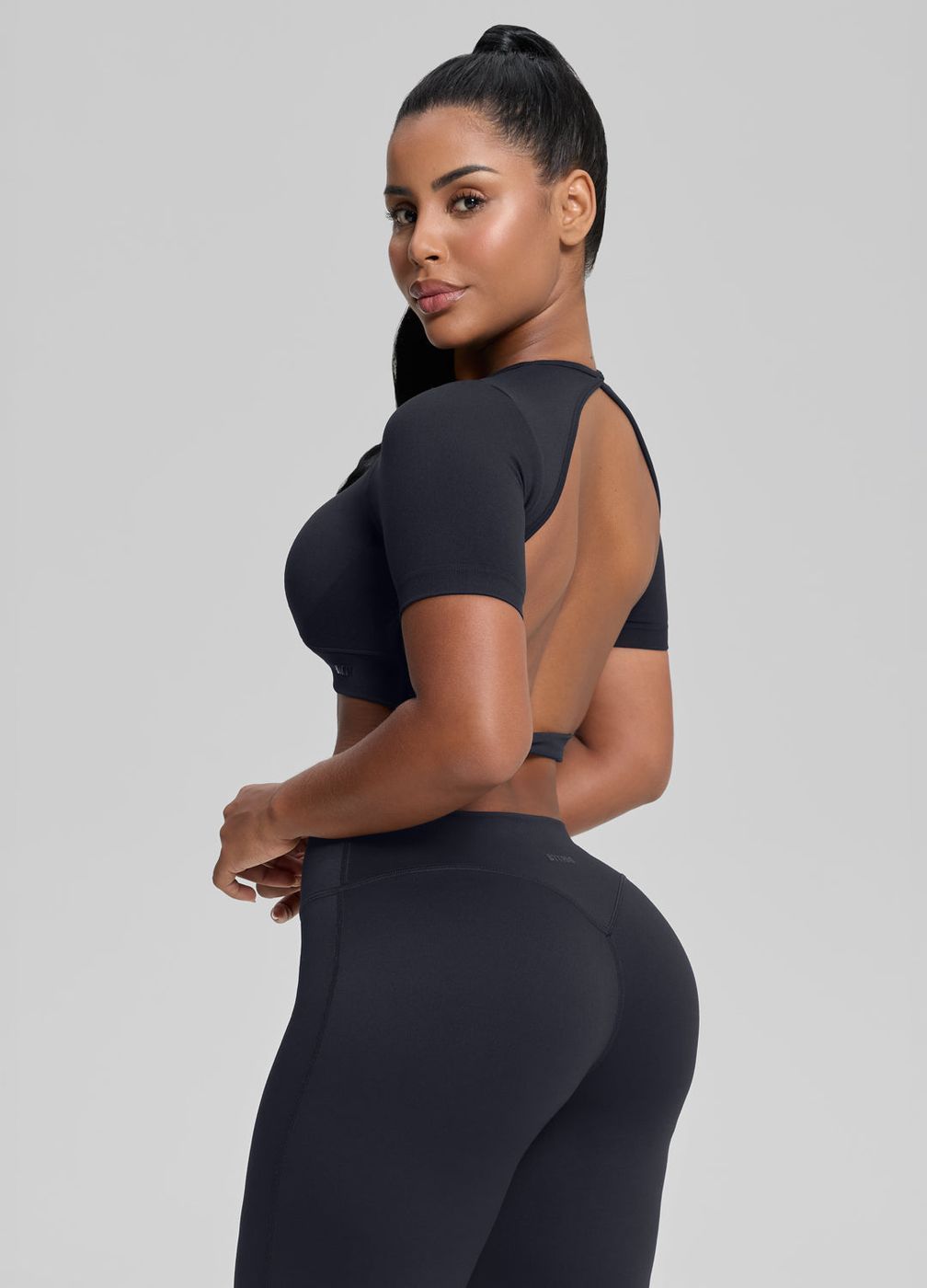 Crew Neckline Backless Crop Top in Black, front view