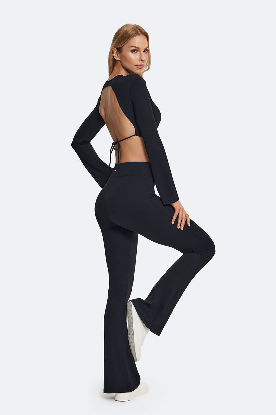 High-waisted Flared Leggings in Black, front view