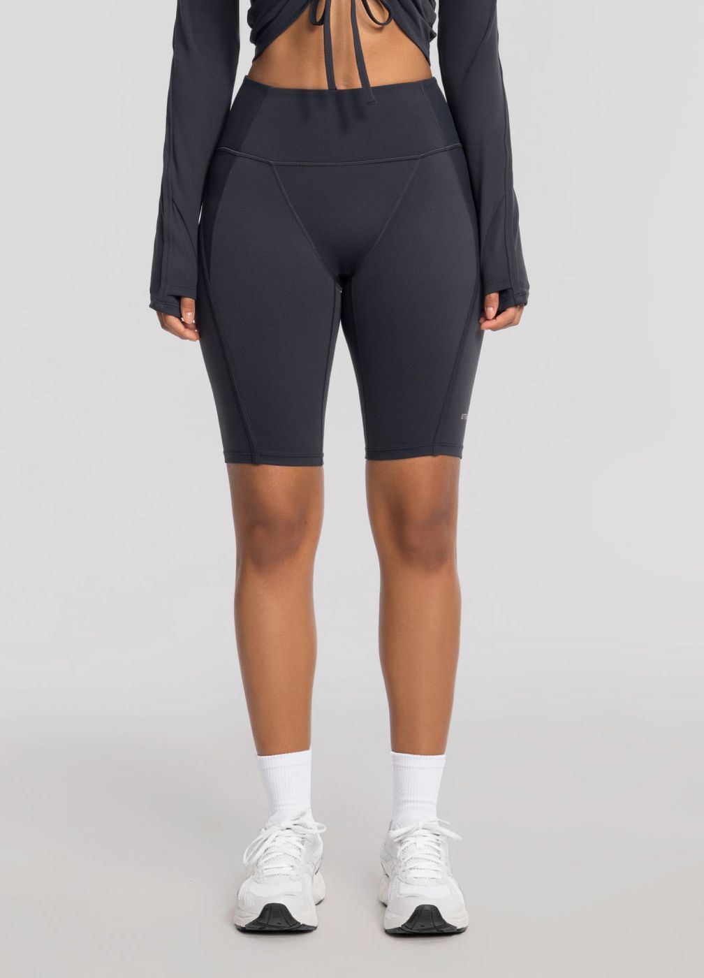 High-waisted Performance Biker Shorts in Charcoal, front view