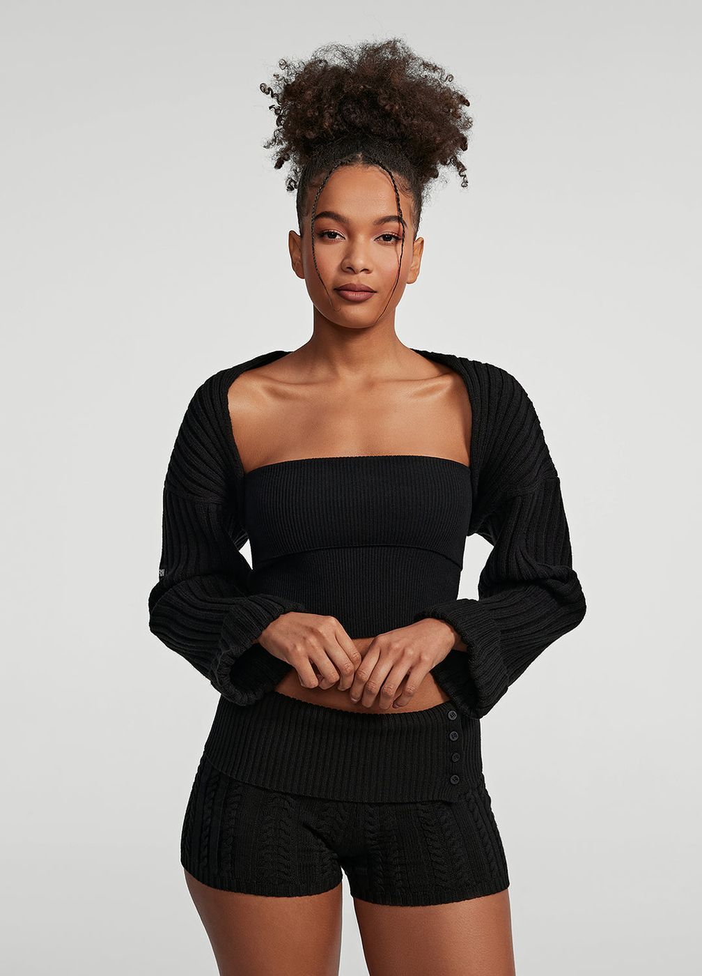 Ribbed Knit Shrug in Black, front view