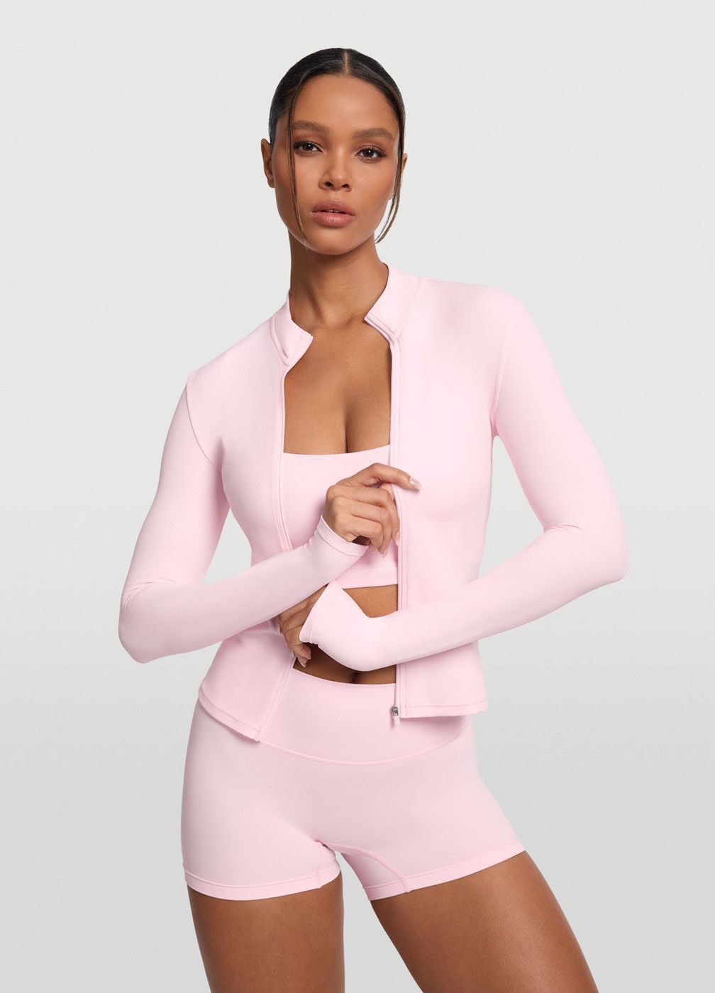 Sleek Zip-up Long Sleeve Jacket in Ballet Pink, front view