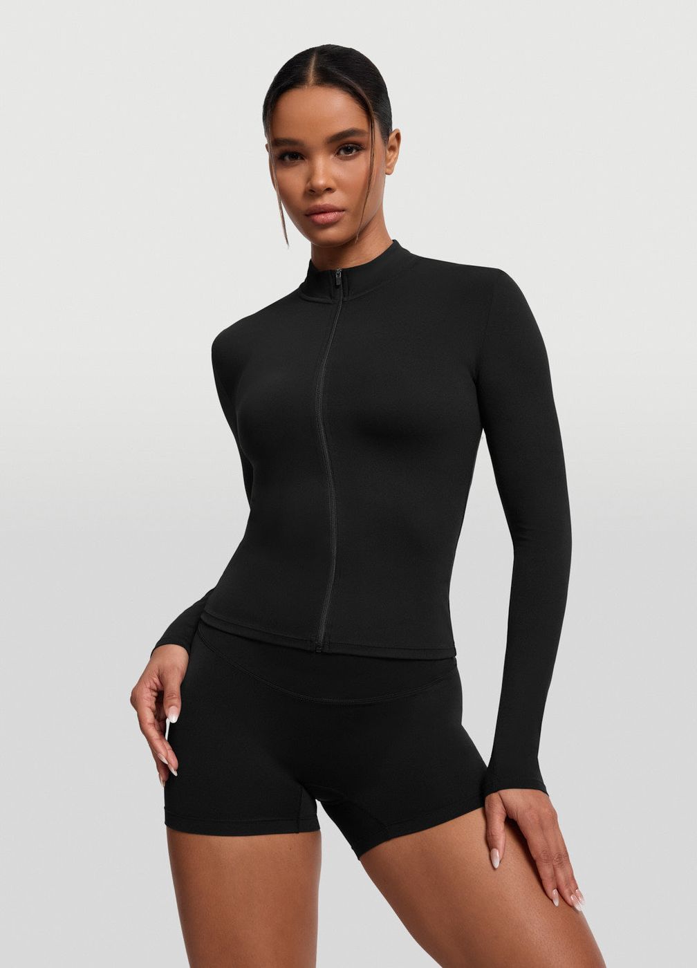 Sleek Zip-up Long Sleeve Jacket in Black, front view