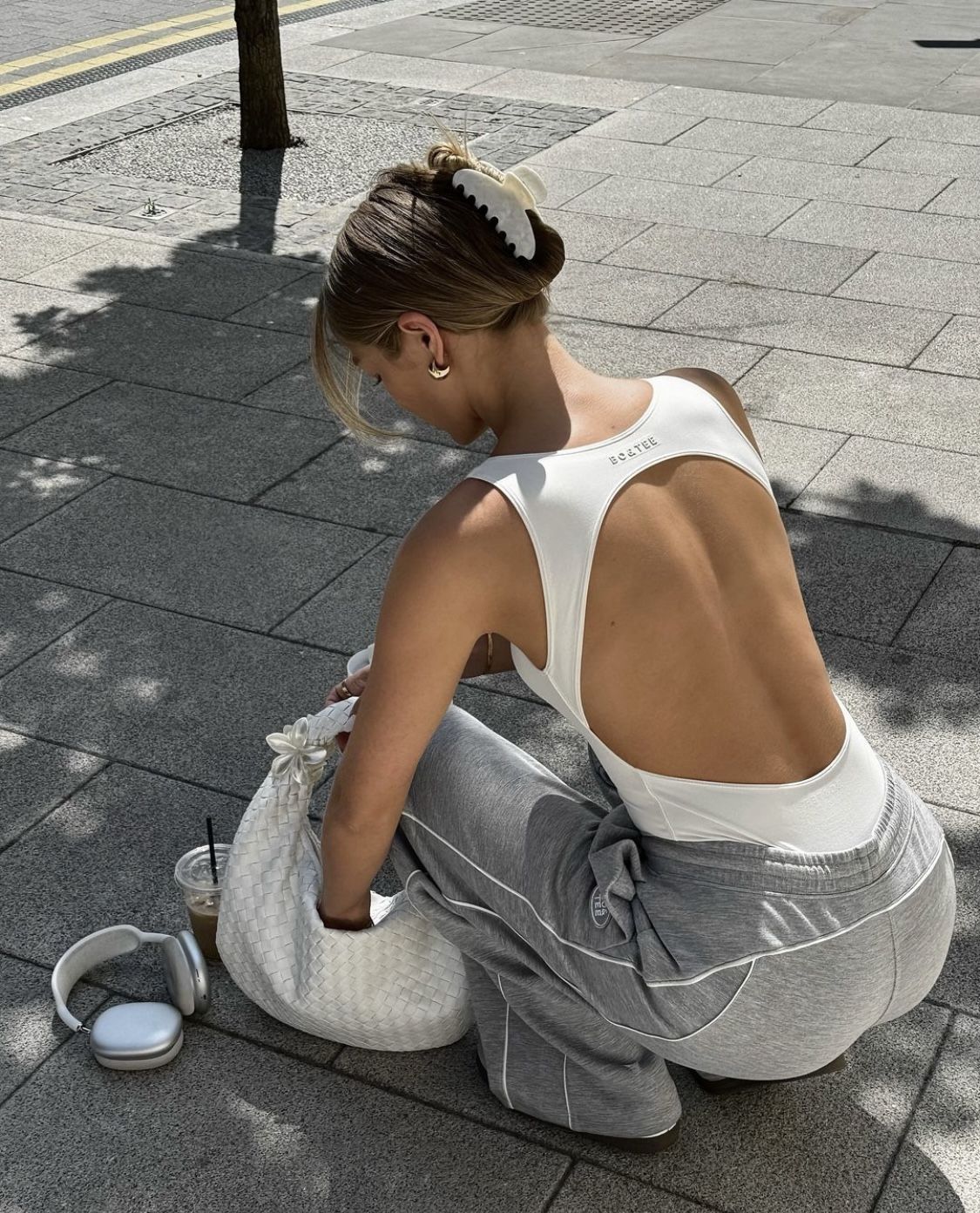 A racerback tank against bare skin across the shoulders
